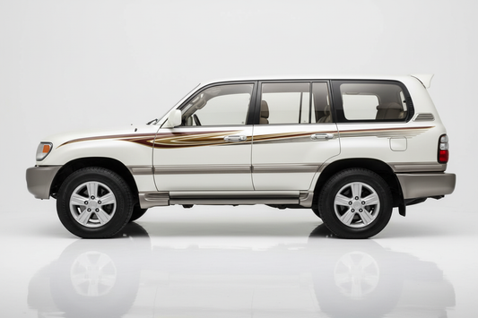 White Land Cruiser with gold and brown stripes facing left