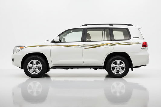 White Land Cruiser with gold and green angular stripes facing left